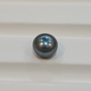 Black moti pearl 6.45 carat 7.16 ratti